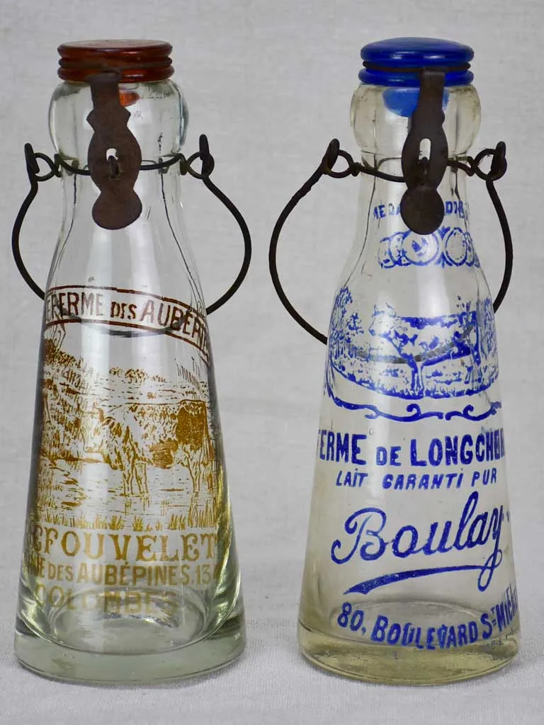 Antique French glass milk bottle with blue decoration