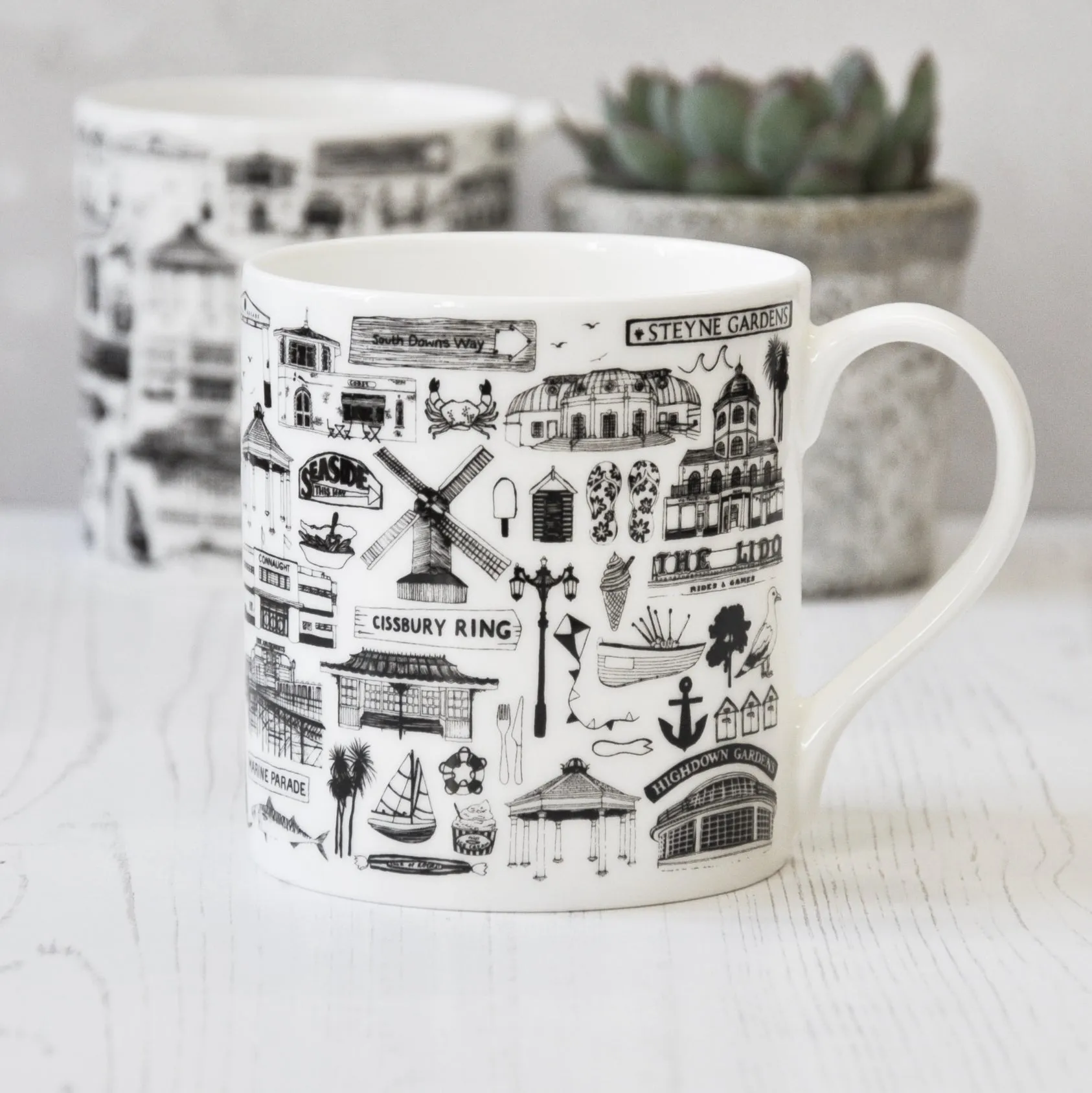 Worthing illustrated black and white mug